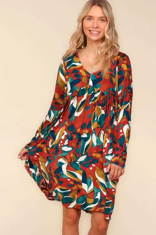 RUST BABYDOLL EMPIRE WAIST ABSTRACT PRINT DRESS